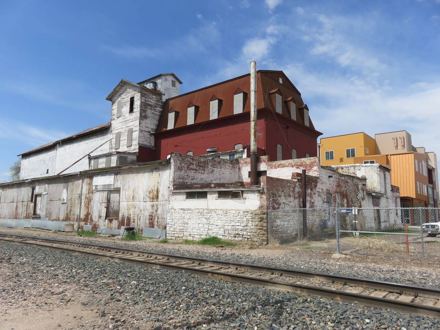 Downtown Loveland, Colorado — the historic feed mill beside the railroad tracks